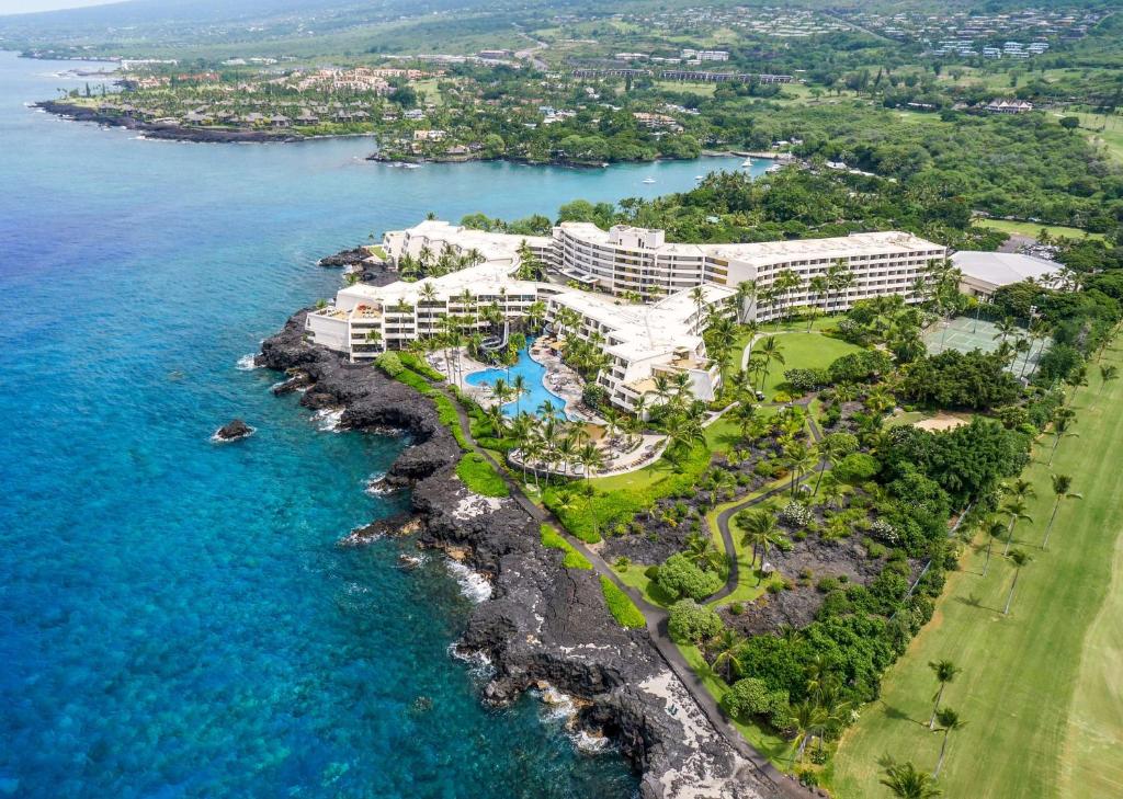 an aerial view of a resort next to the ocean at Outrigger Kona Resort and Spa in Kailua-Kona