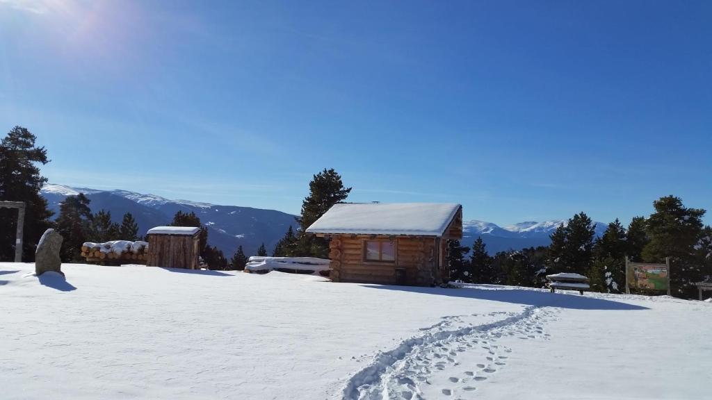 Apartamento con piscina en Osseja v zimě
