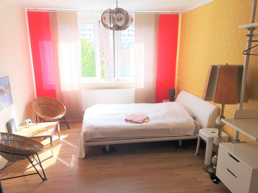 Кровать или кровати в номере Mitte von Mitte - Blick auf den Turm