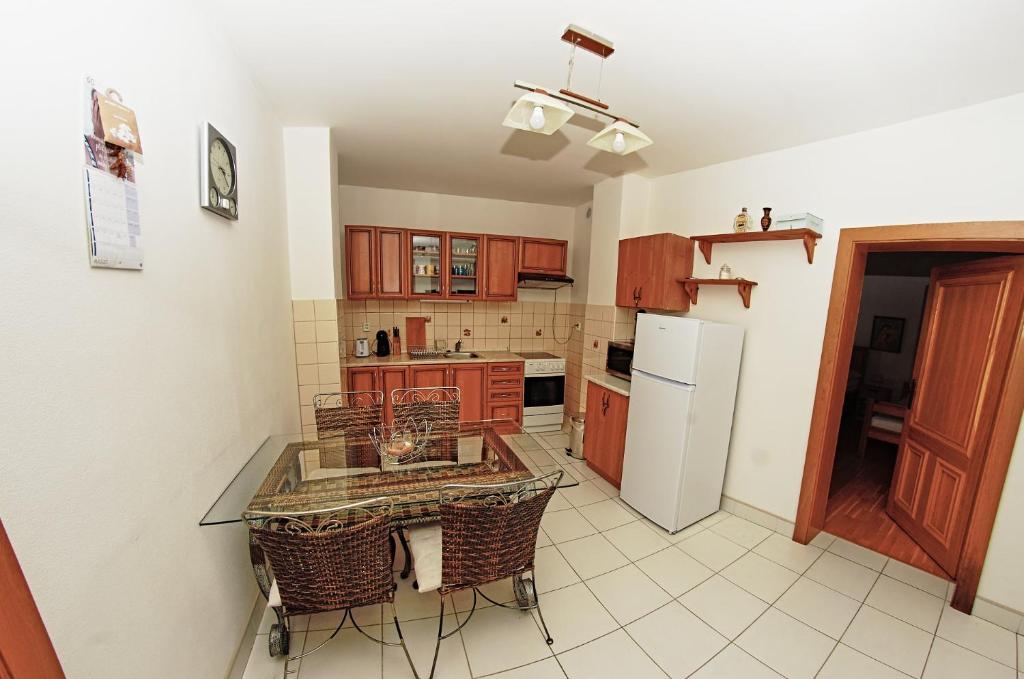 Kuchyň nebo kuchyňský kout v ubytování Apartmany pod Tatrami