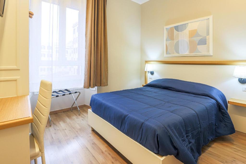 Vuode tai vuoteita majoituspaikassa Binario Zero