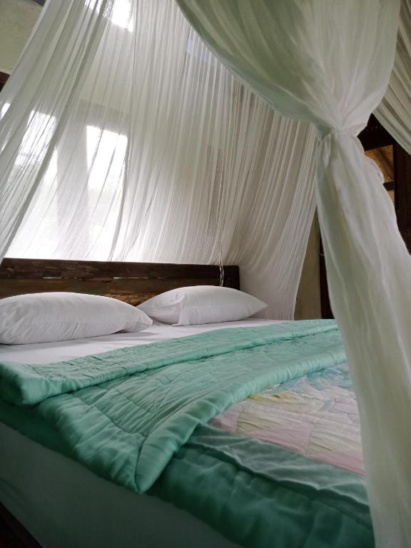 Postel nebo postele na pokoji v ubytování duegoal farmhouse