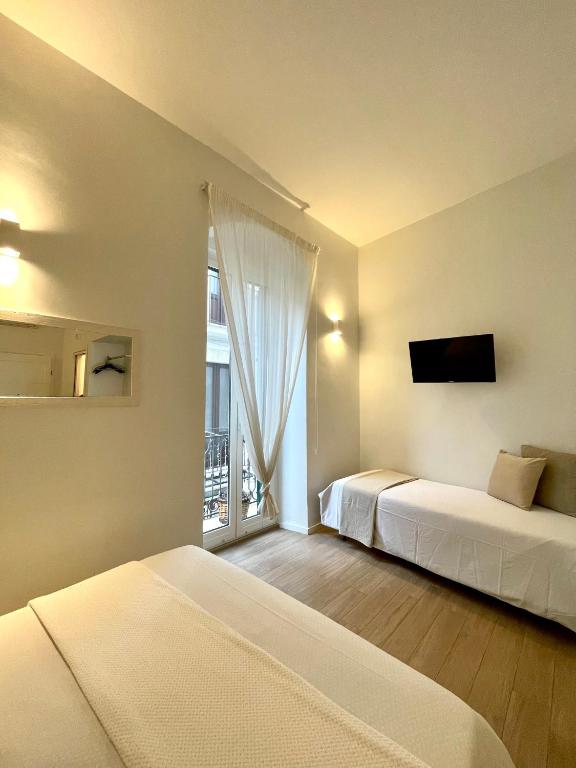 Postel nebo postele na pokoji v ubytování Blanco B&B - Group
