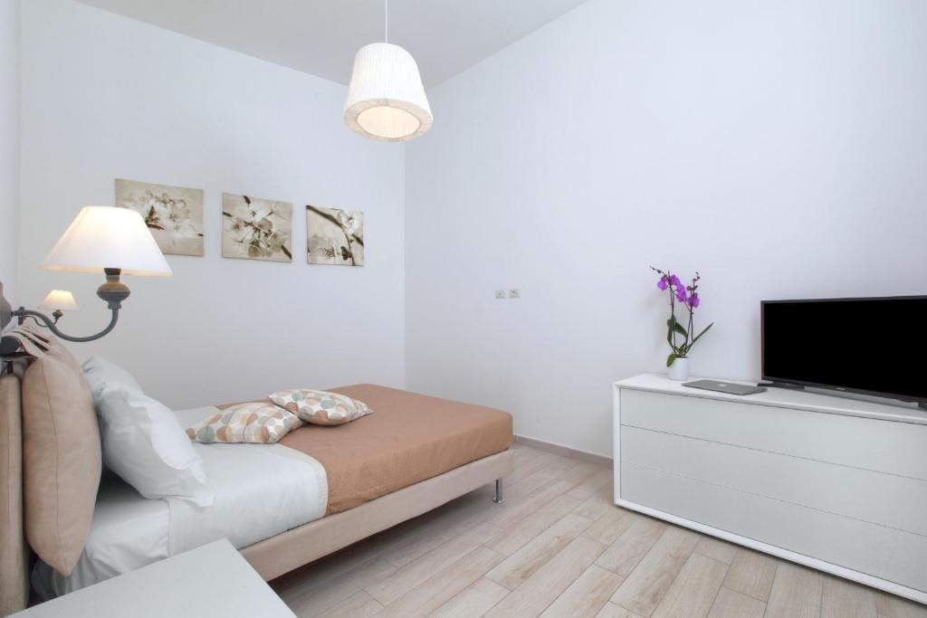 Telewizja i/lub zestaw kina domowego w obiekcie Amore Rentals - Villa Anna
