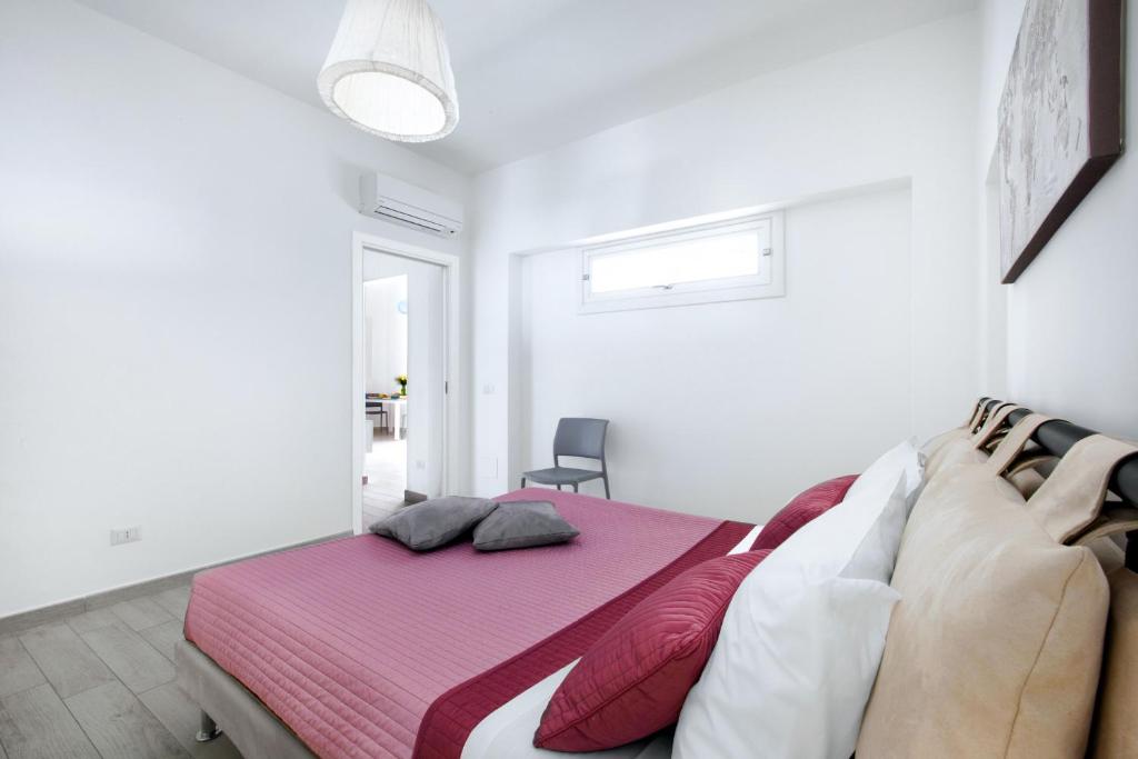 Łóżko lub łóżka w pokoju w obiekcie Amore Rentals - Villa Anna