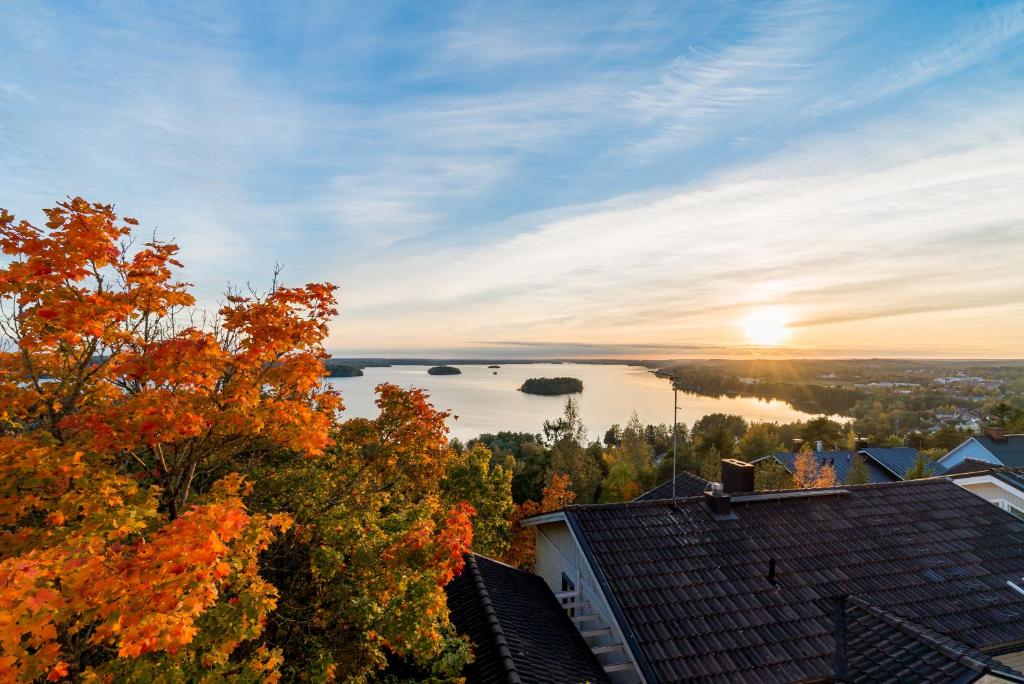 a view of a lake from a house at Studio apartment in lake views in Tampere