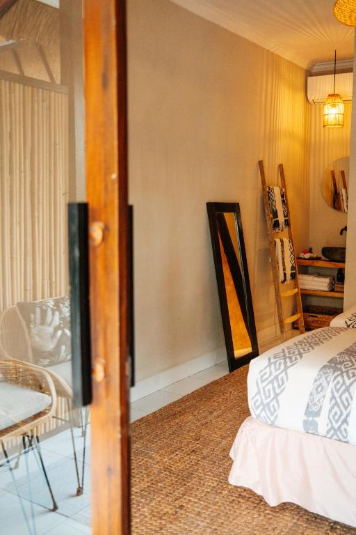 Postel nebo postele na pokoji v ubytování Hani Hideaway