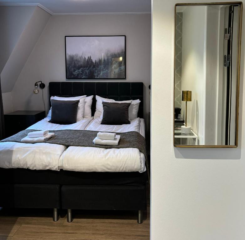 Postel nebo postele na pokoji v ubytování Hotell Esplanad