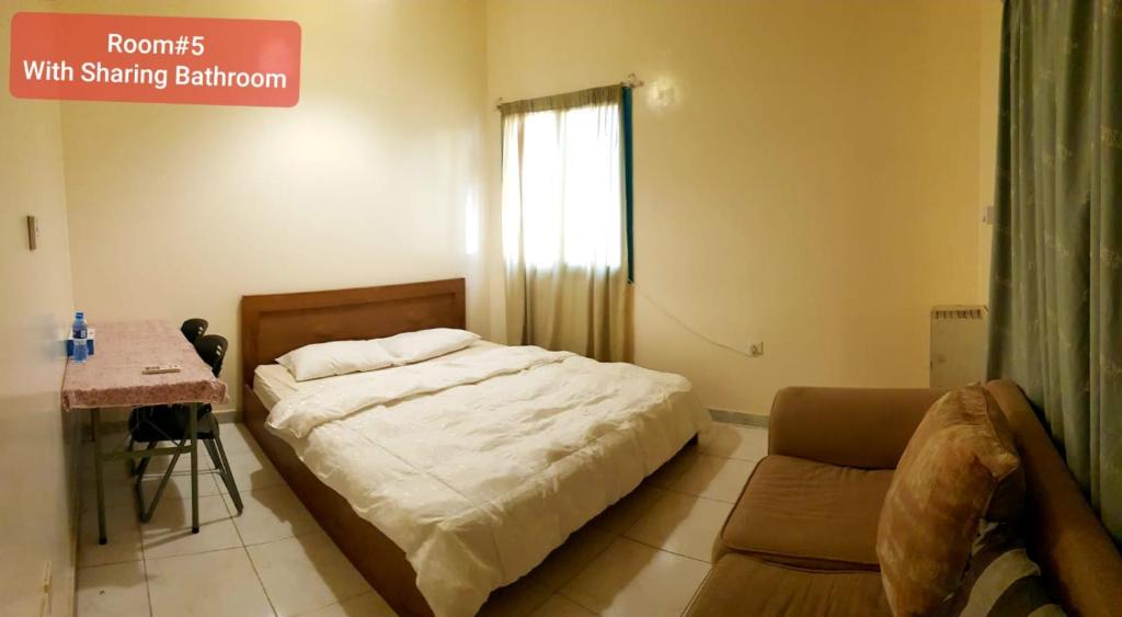 Postel nebo postele na pokoji v ubytování Bzxmax Guest House