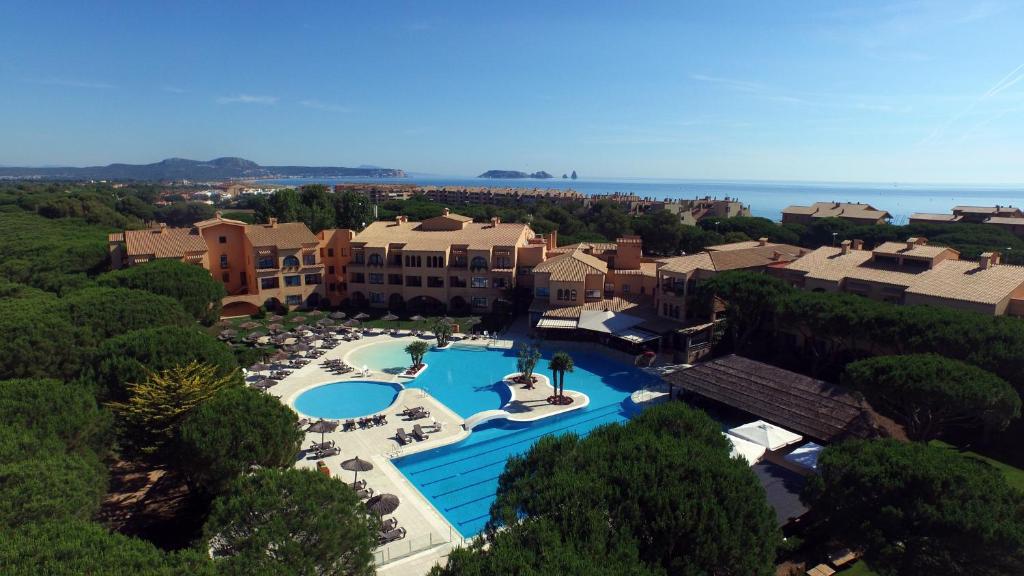 an aerial view of a resort with a swimming pool at La Costa Hotel Golf & Beach Resort in Pals