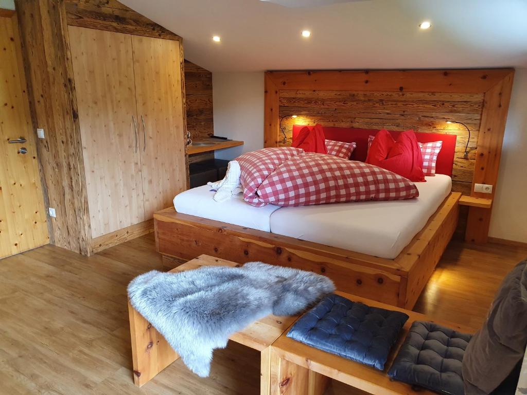 Postel nebo postele na pokoji v ubytování Boutique Hotel Alpenhof