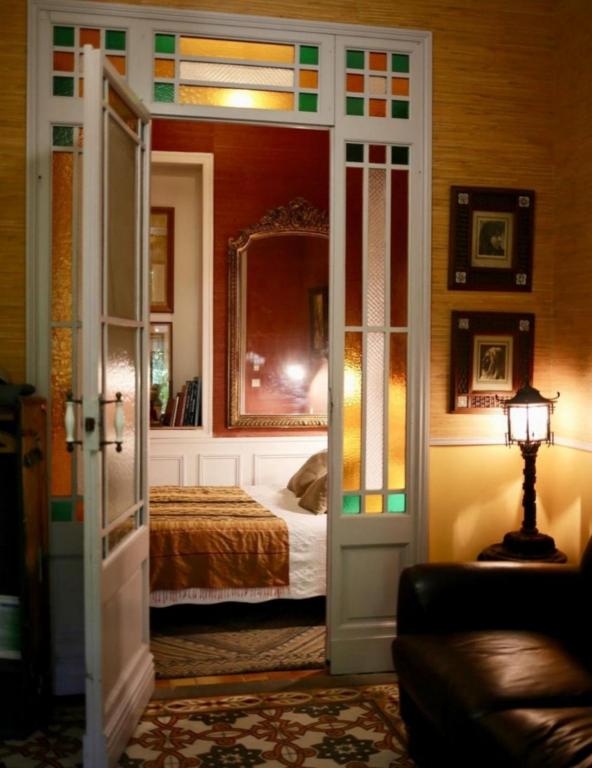 an open door to a bedroom with a bed at La Petite Calanque in Marseille