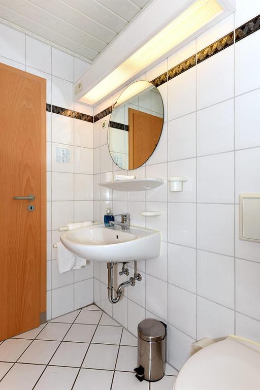 Koupelna v ubytování Hotel garni Poggenstool