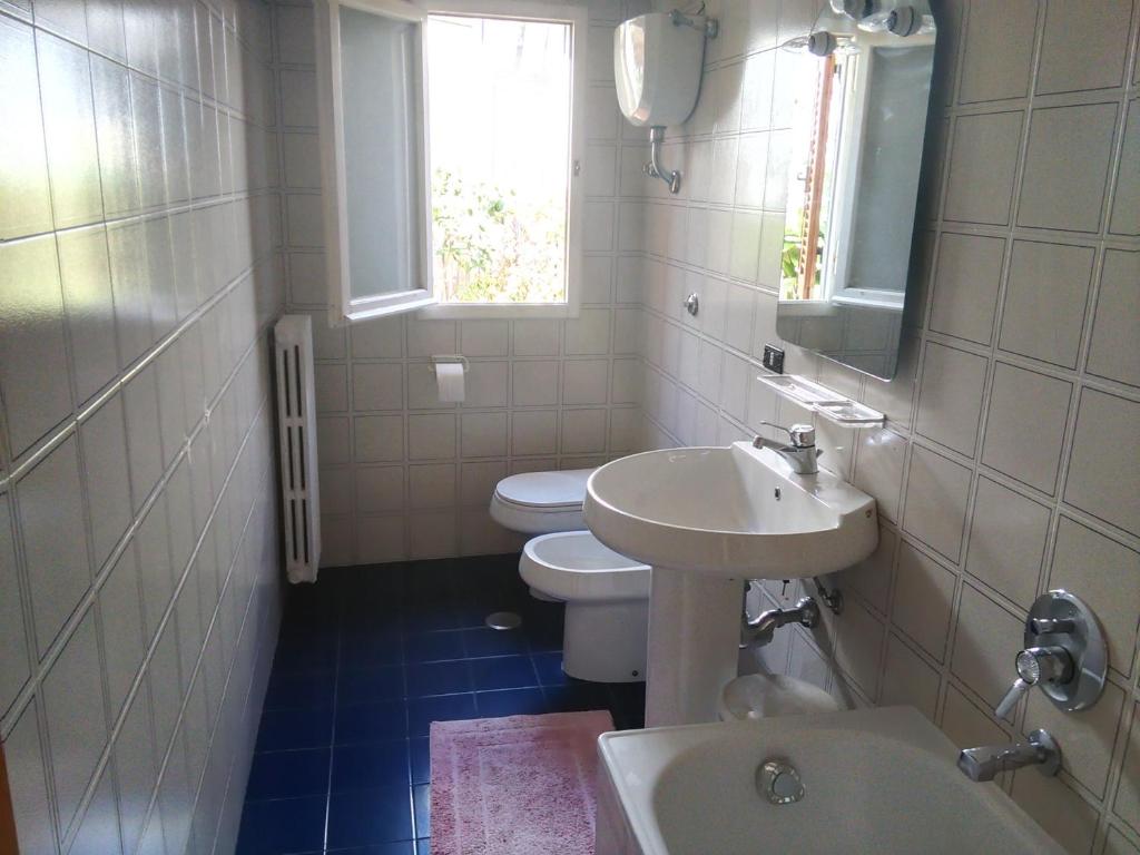 Koupelna v ubytování Albergo Villa Sorriso