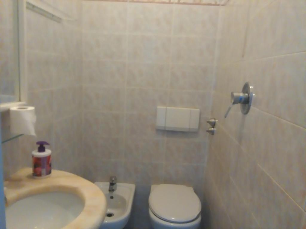 Koupelna v ubytování Albergo Villa Sorriso