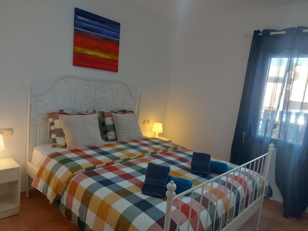 Postel nebo postele na pokoji v ubytování villa Mimosa