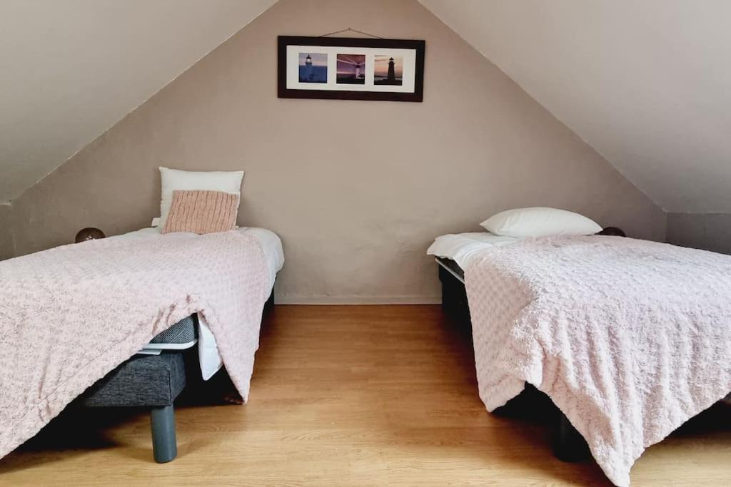 Una cama o camas en una habitaci&oacute;n de *Villa Marine*La Vigie - Duplex