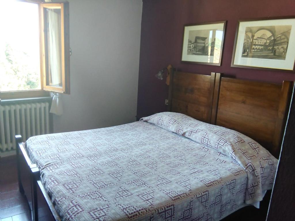 Postel nebo postele na pokoji v ubytování Albergo Villa Sorriso