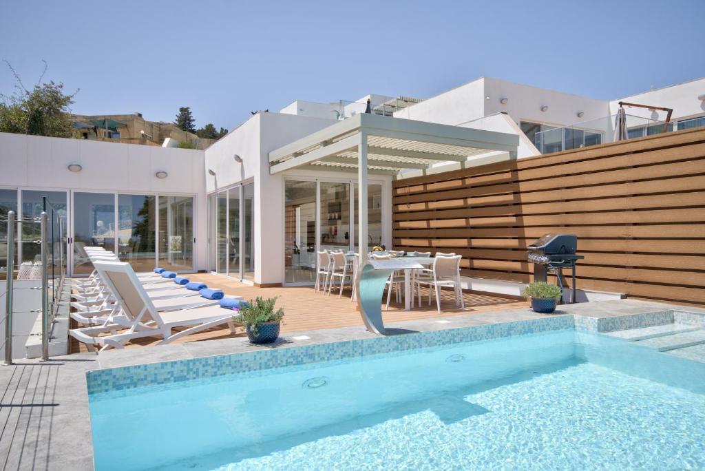 Бассейн в Maltese Luxury Villas - Sunset Infinity Pools, Indoor Heated Pools and More! или поблизости