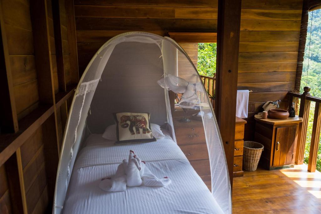 Postel nebo postele na pokoji v ubytování Wanakaset Forest Glamping