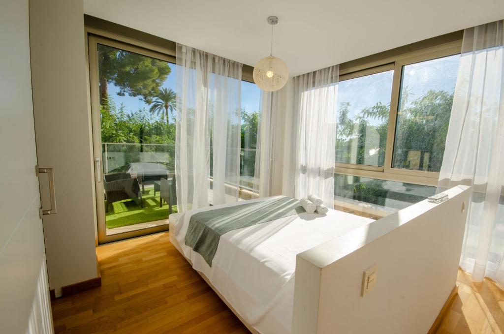 Ένα ή περισσότερα κρεβάτια σε δωμάτιο στο VILLA PARADISE BEACH