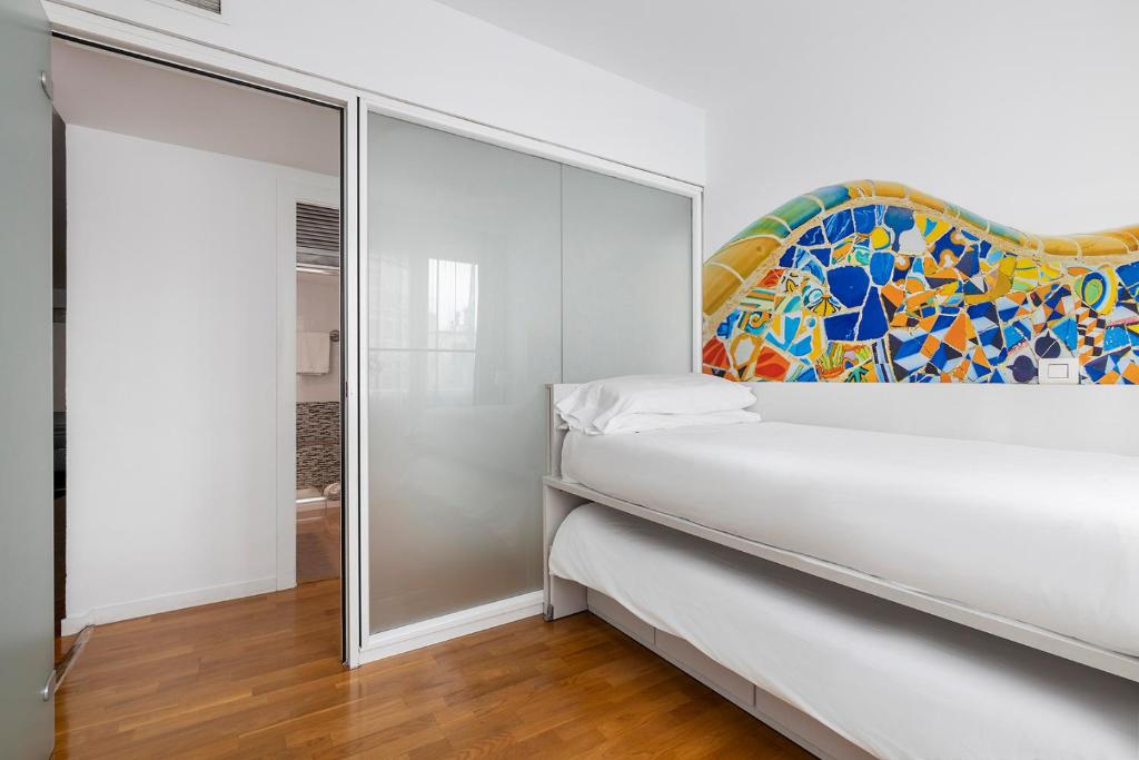 Posteľ alebo postele v izbe v ubytovaní La Mejor Zona de Barcelona