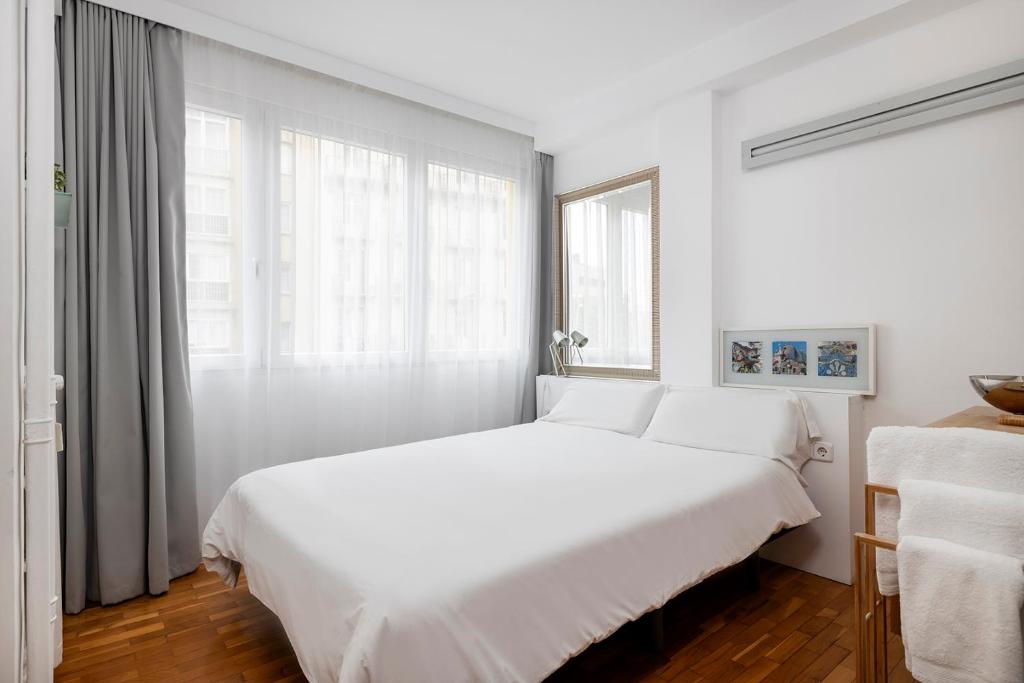 Posteľ alebo postele v izbe v ubytovaní La Mejor Zona de Barcelona