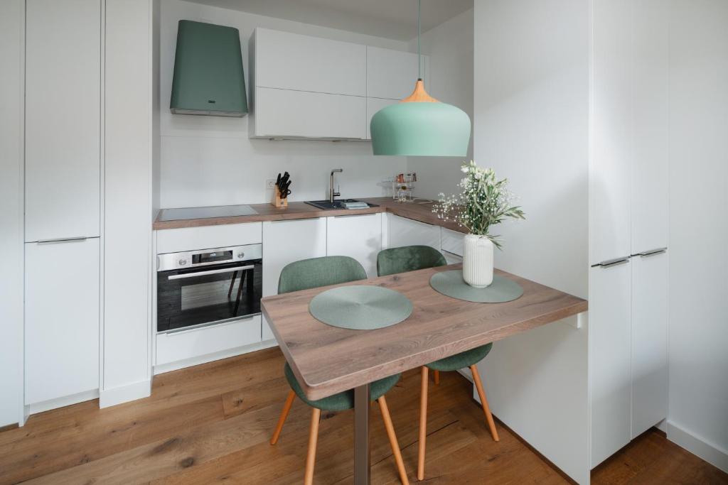 Eldhús eða eldhúskrókur á Haus Noena - Wohnung 7 Inselschatz