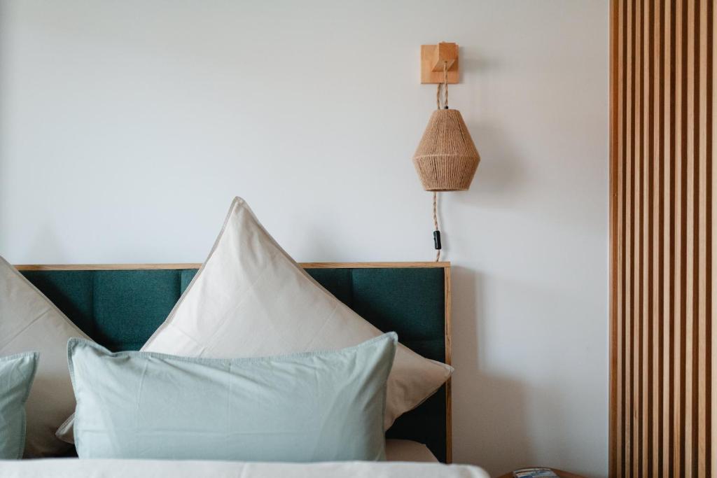 Rúm í herbergi á Haus Noena - Wohnung 7 Inselschatz