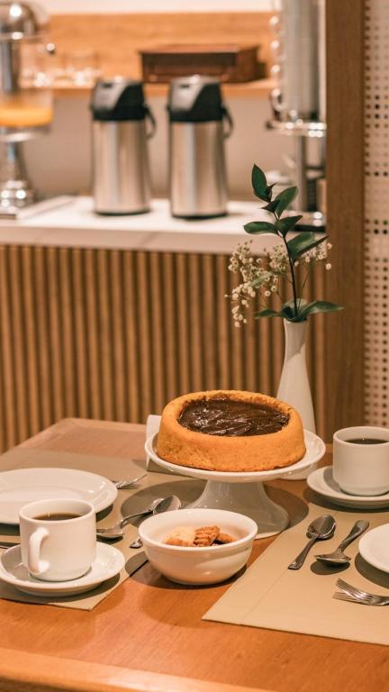 Comodidades para preparar café e chá em Village Du Lac Hotel
