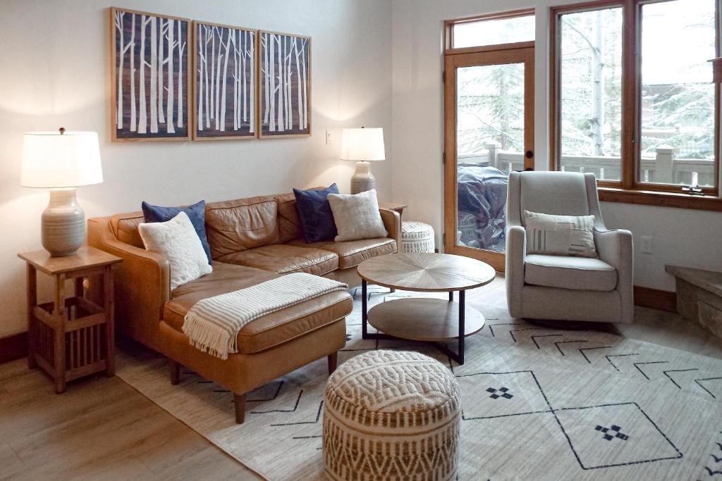 a living room with a couch and a chair at The Ski Lodge, Unit 306 in Edwards
