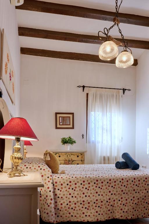 Postel nebo postele na pokoji v ubytování Apartamento Rural Villa Aurora