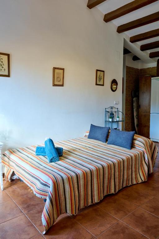 Postel nebo postele na pokoji v ubytování Apartamento Rural Villa Aurora