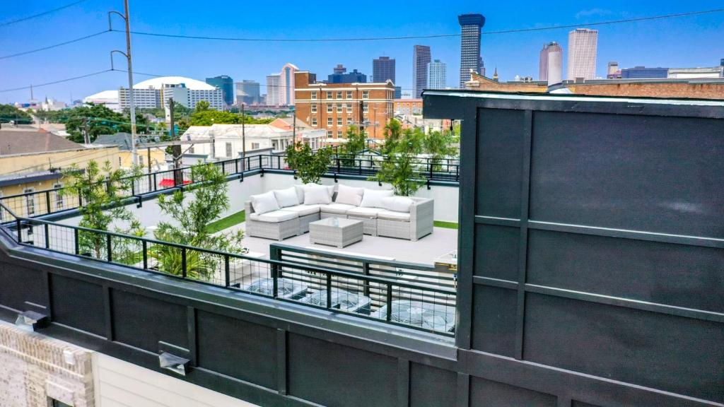 a balcony with a view of a city skyline at Nova Rooftop Villa in New Orleans