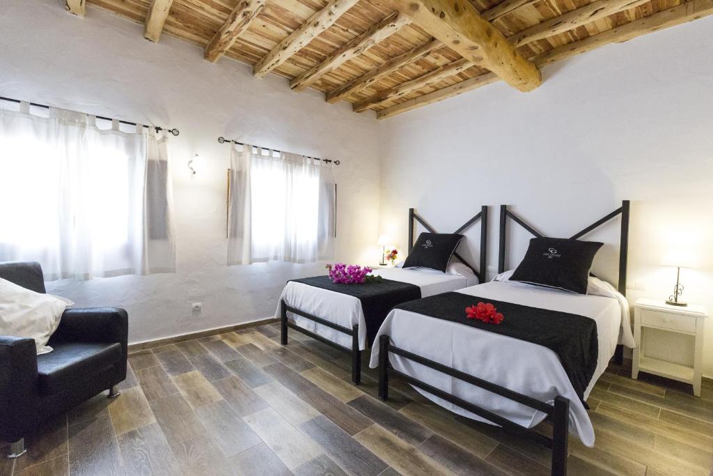 Postel nebo postele na pokoji v ubytování Agroturismo Can Guillem