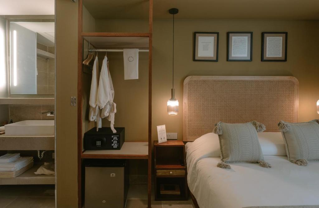 Postel nebo postele na pokoji v ubytování Hotel Sureño Yucatan