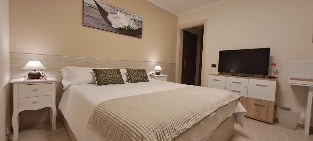 Postel nebo postele na pokoji v ubytování B&B Monastero