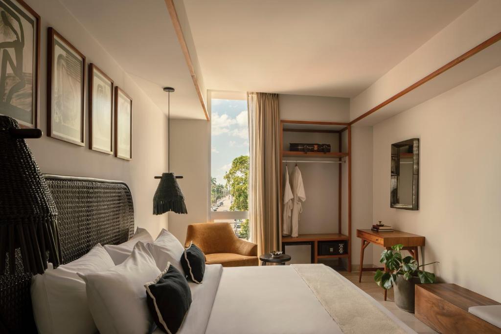 Postel nebo postele na pokoji v ubytování Hotel Sureño Yucatan