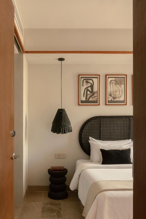 Postel nebo postele na pokoji v ubytování Hotel Sureño Yucatan