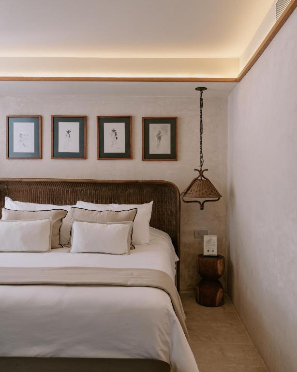 Postel nebo postele na pokoji v ubytování Hotel Sureño Yucatan