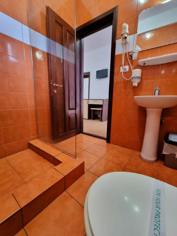 Koupelna v ubytování Hotel Perla Oltului