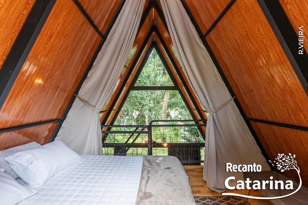 Postel nebo postele na pokoji v ubytování Recanto Catarina