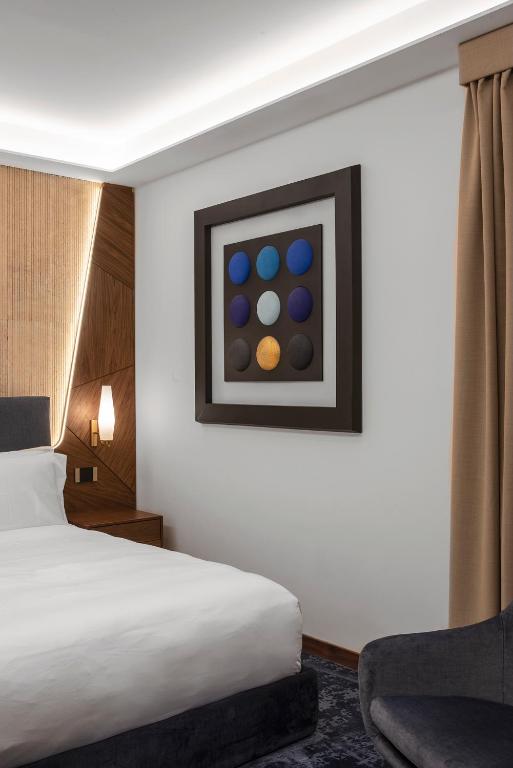 Hotel Via Venetoにあるベッド