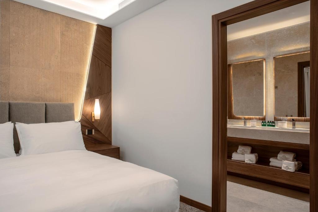 Hotel Via Venetoにあるベッド