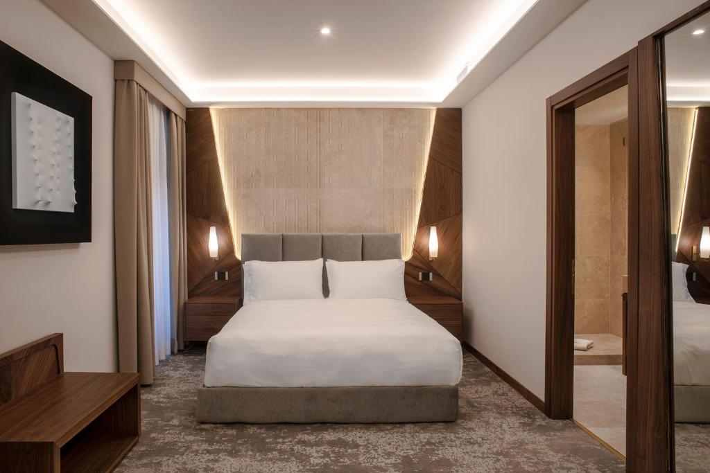 Hotel Via Venetoにあるベッド