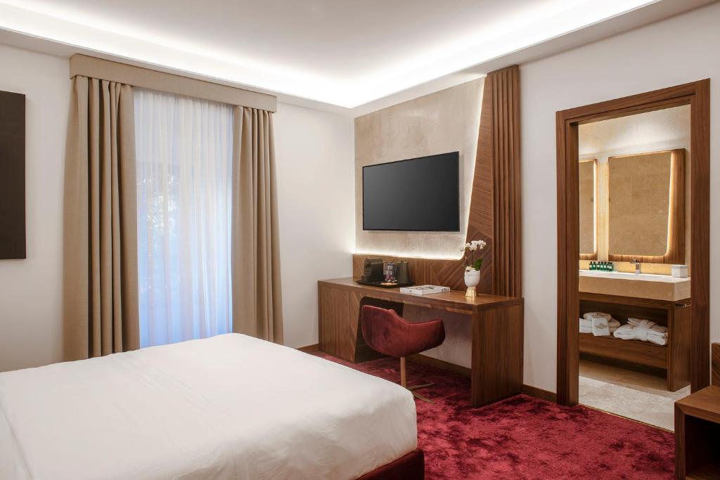 Hotel Via Venetoにあるテレビまたはエンターテインメントセンター