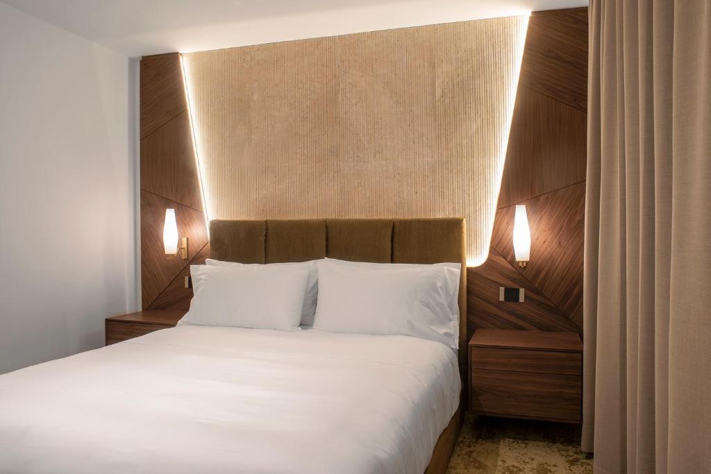 Hotel Via Venetoにあるベッド