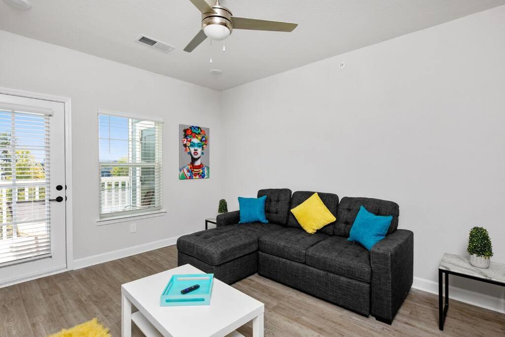 a living room with a couch and a table at 2ba/2br PNC Music Pavilion_8306 in University Place
