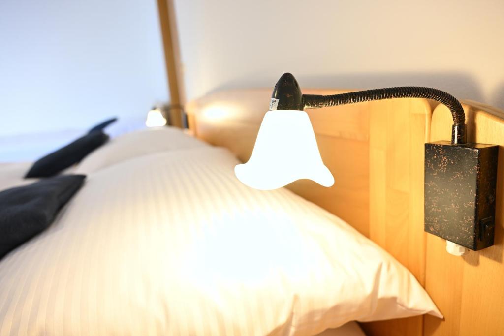 Postel nebo postele na pokoji v ubytování Hotel Eufória
