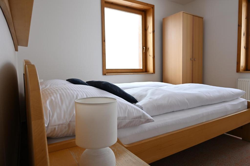 Postel nebo postele na pokoji v ubytování Hotel Eufória